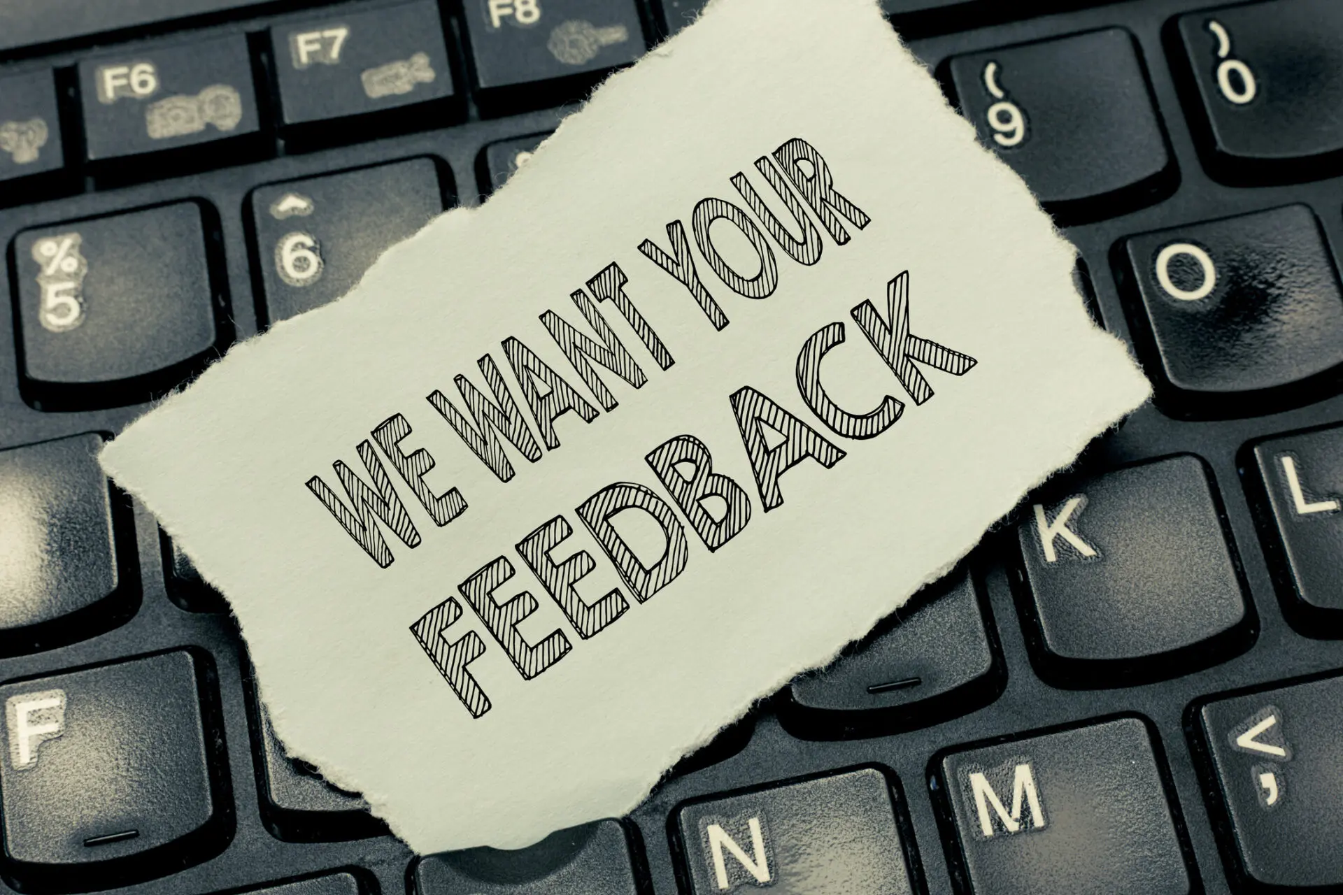 hand writing showing We Want Your Feedback